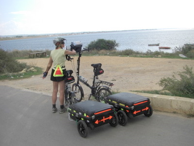 Terry, stretching and holding the bikes.